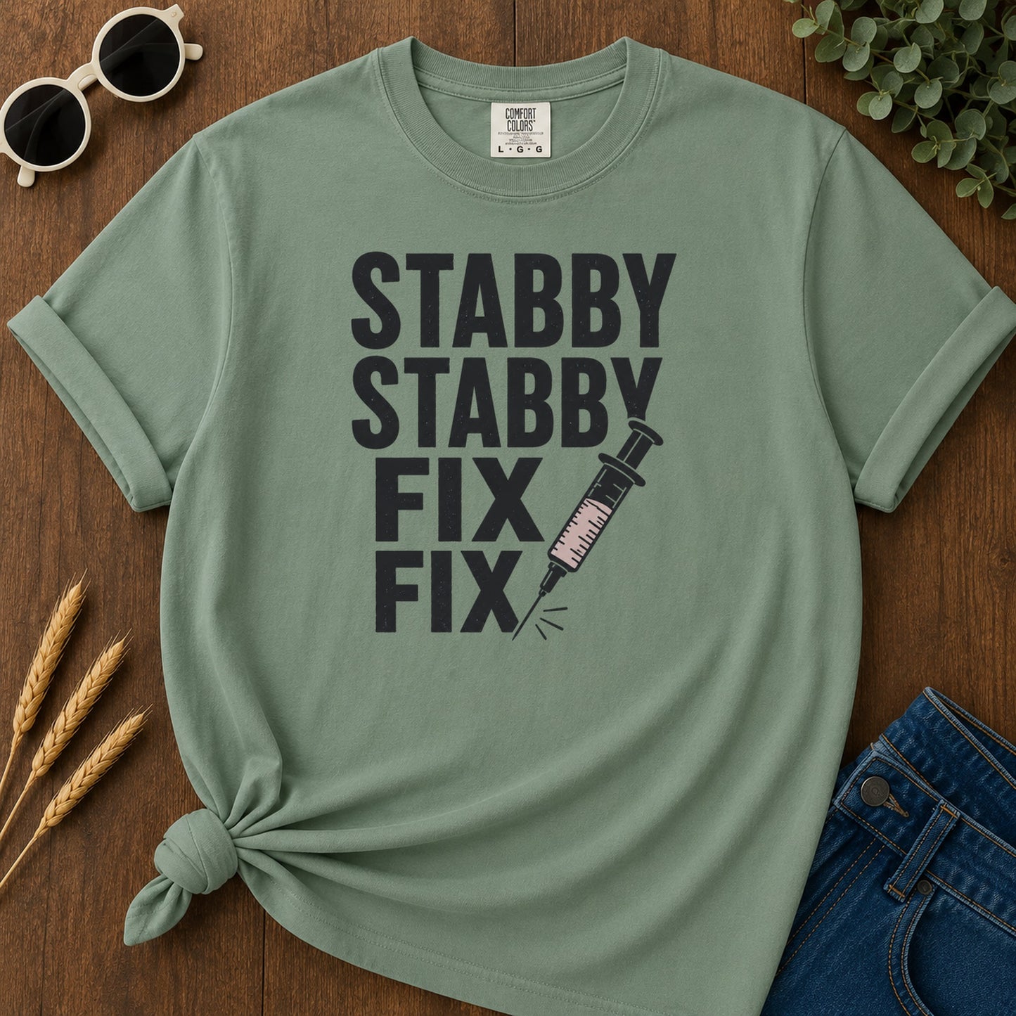 Stabby Stabby Fix Fix T-Shirt - Light Green Mockup