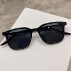 Black frame black and gray piece