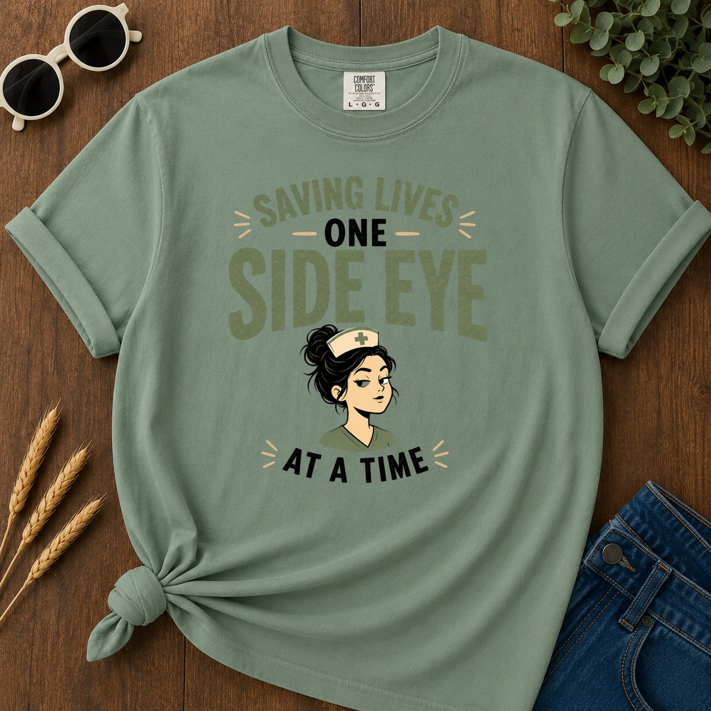 Saving Lives One Side Eye T-Shirt - Light Green Mockup