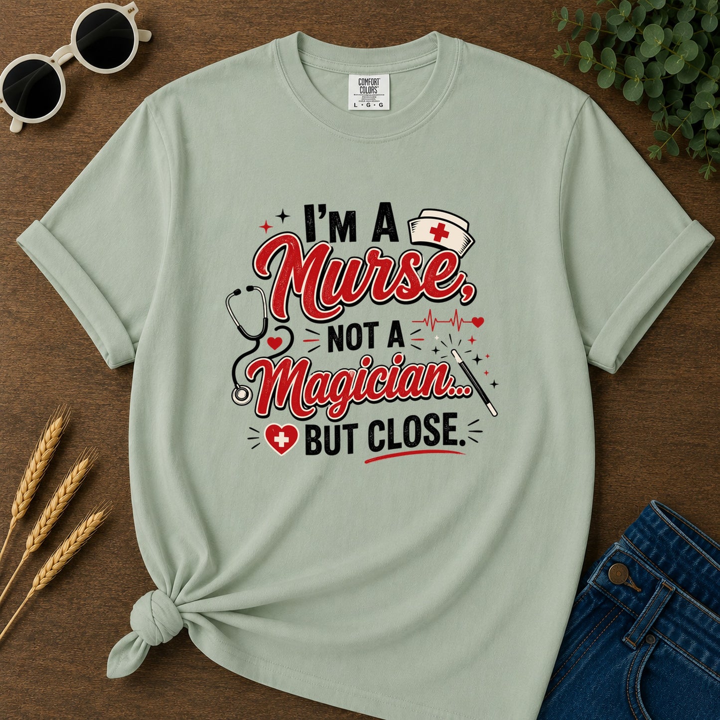 A Nurse Not A Magician T-Shirt - Bay